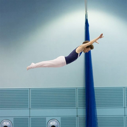A gymnast performing a forwards sommersault